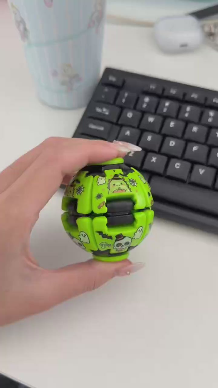 Green Halloween fidget spinner ball demonstration showing handheld play
